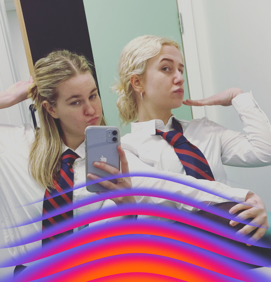 Abbie and fellow student pose in school uniform costume