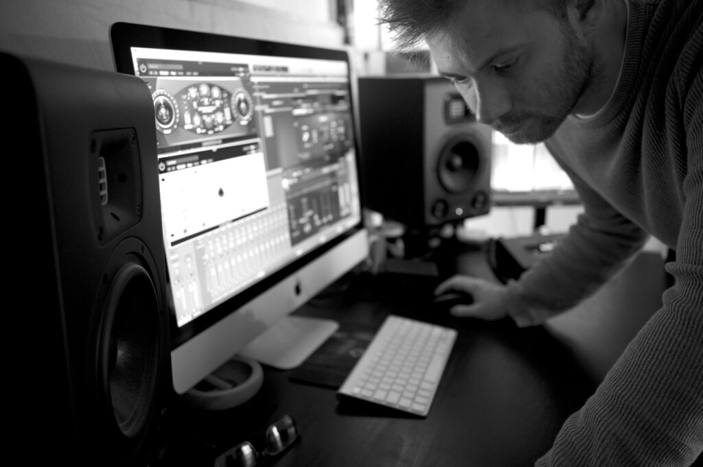 Josh Trinnaman, using music software on a computer