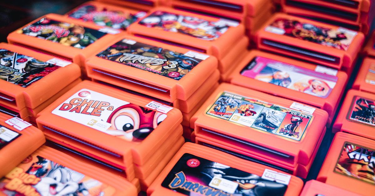 Piles of orange video game cartridges for retro video game console