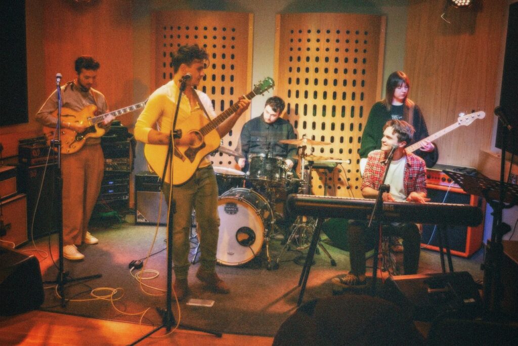 Wooden Dog on stage performing